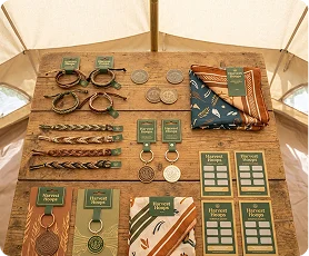 Harvest Hoops merchandise displayed across a wooden table